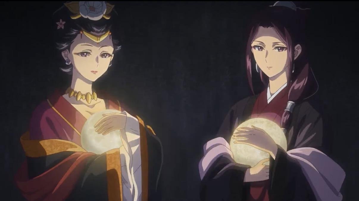 Two women holding glowing orbs in The Apothecary Diaries Season 3